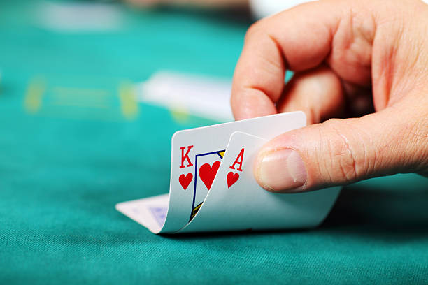Live baccarat table with dealer and shoe